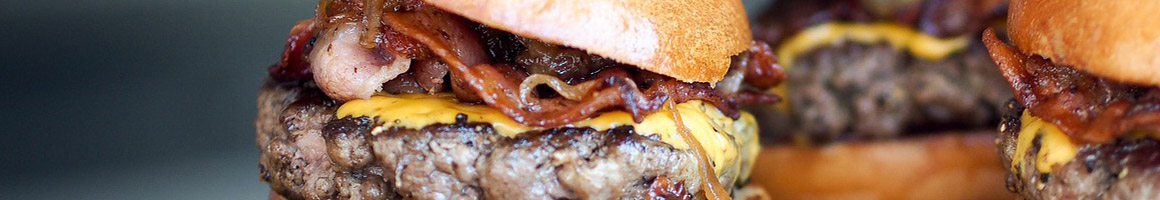 Eating Burger at Crabbs Tropical Treat restaurant in Hanover, PA.